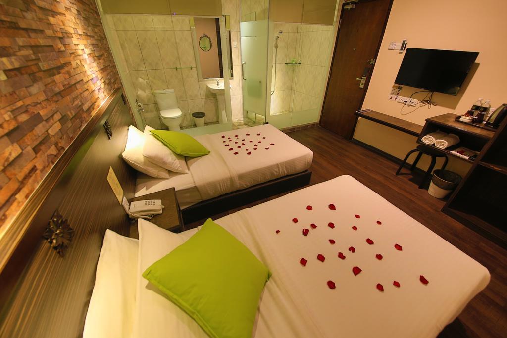 Apple Hotel Penang Джорджтаун Экстерьер фото
